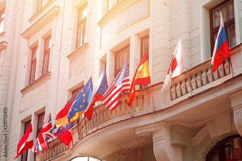 Flags of russia, united states, european union, USA, japan, england, czech republic, Germany on embassy house