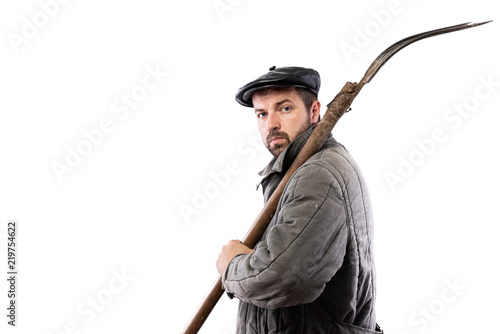 Peasant man with pitchfork on white background, serious concentrated look. Concept - hard life of peasant