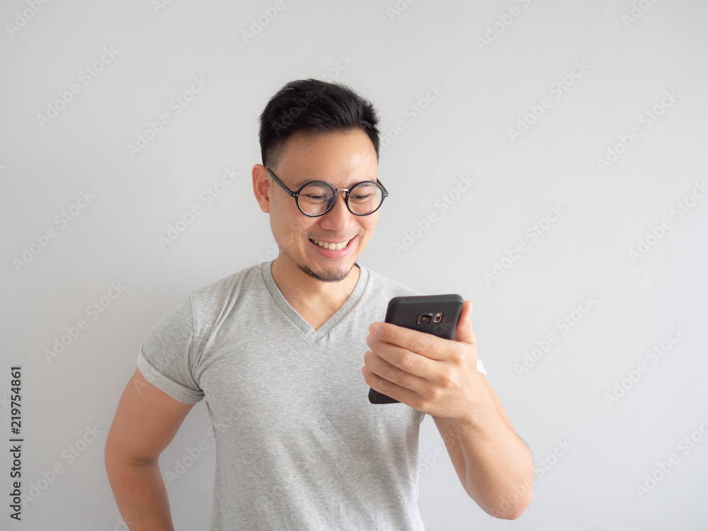 Man happy to see what in the smartphone. Man happy to see what in the smartphone.