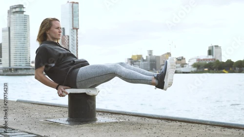 Young girl ABS exercise in the dock, Rotterdam, fitness