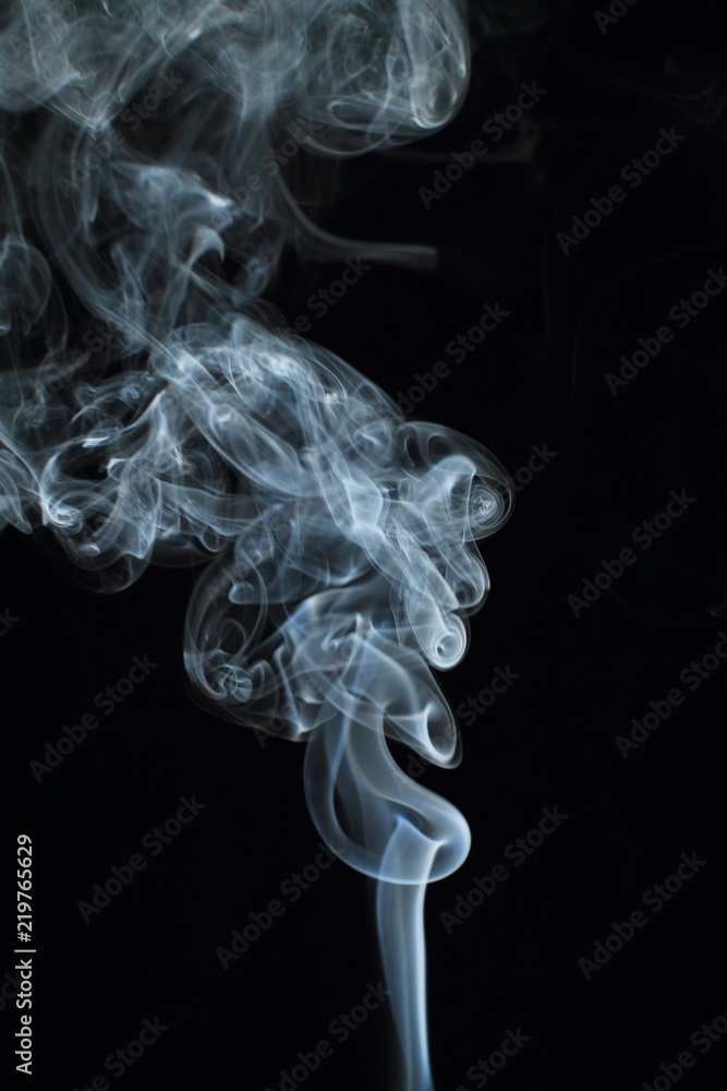 White smoke texture on black background White smoke texture on black background