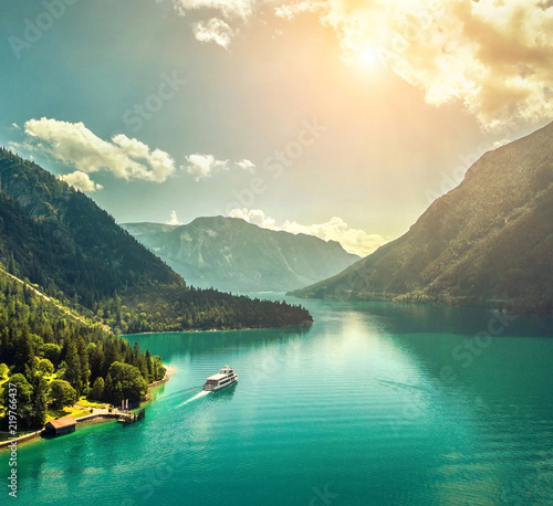 Beautiful morning sunrise view on the mountain lake in Alps 