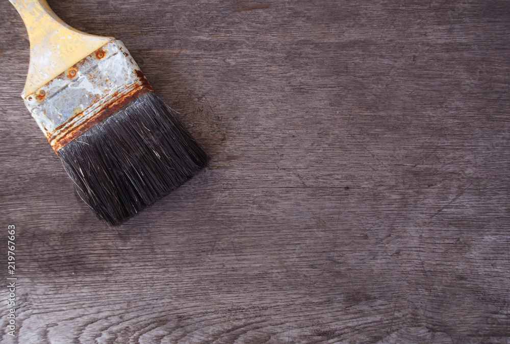 top view paint brush on rustic wooden table top view paint brush on rustic wooden table