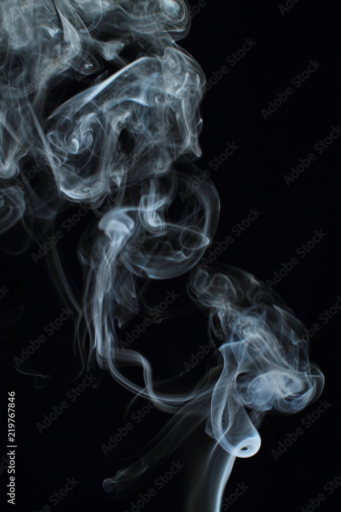 White smoke texture on black background White smoke texture on black background