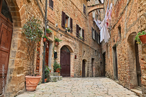 Fototapeta Naklejka Na Ścianę i Meble -  Volterra, Pisa, Tuscany, Italy: ancient alley in the old town