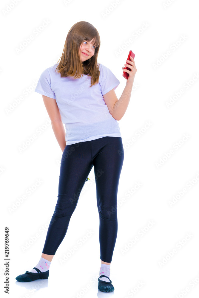 The girl is using a cell phone. The girl is using a cell phone.