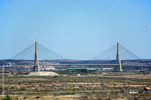 The Guadiana international bridge which links Portugal to Spain and surrounding countryside on both sides of the river of Spain and Portugal, Castro Marim, Algarve, Portugal.