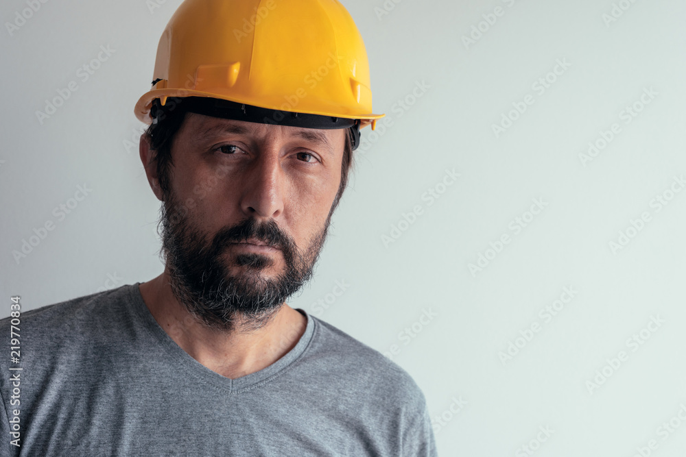 Portrait of serious thoughtful construction engineer Portrait of serious thoughtful construction engineer
