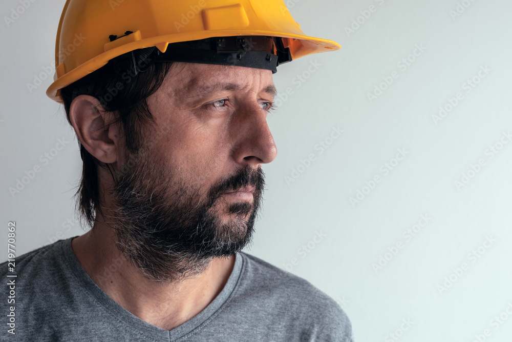 Portrait of serious thoughtful construction engineer Portrait of serious thoughtful construction engineer