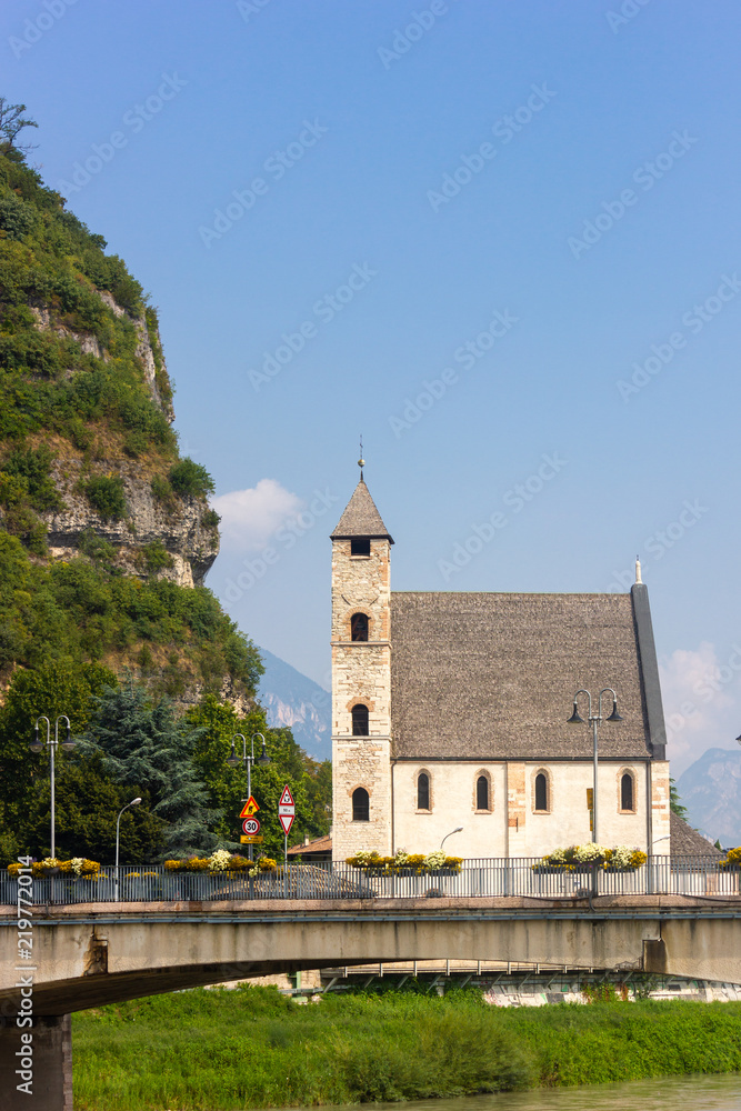 Church of St Apollinare and San Lorenzo bridge in Trento, Italy