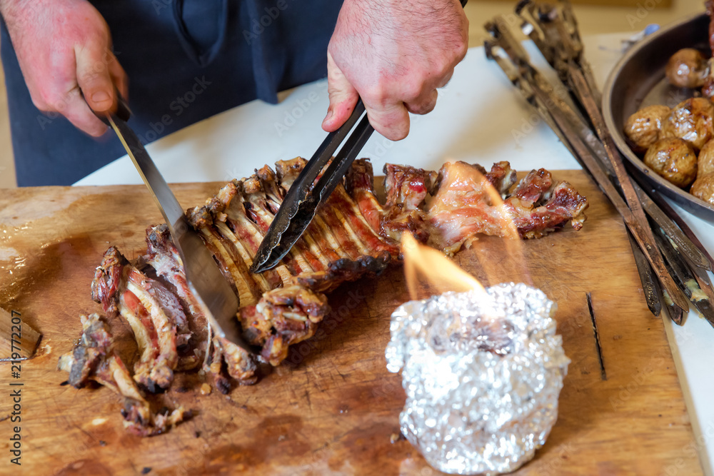 Roasted meat over an open fire, cooked in a special way.Barbecue is prepared of lamb or sheep meat and processed by slasher.