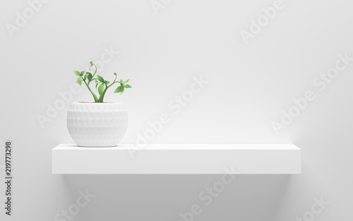 Fotótapéta white shelf with green potted plant on wall with light from the top