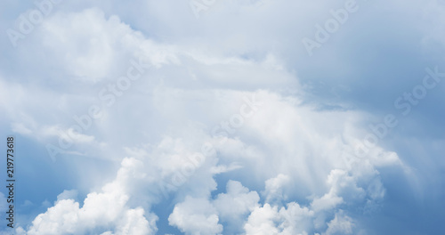 Blue sky background with clouds. Close up. © artemp1