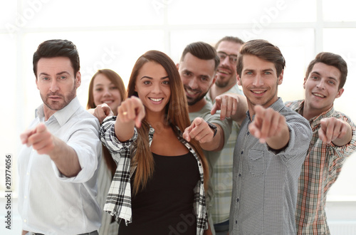 group of young people pointing at you