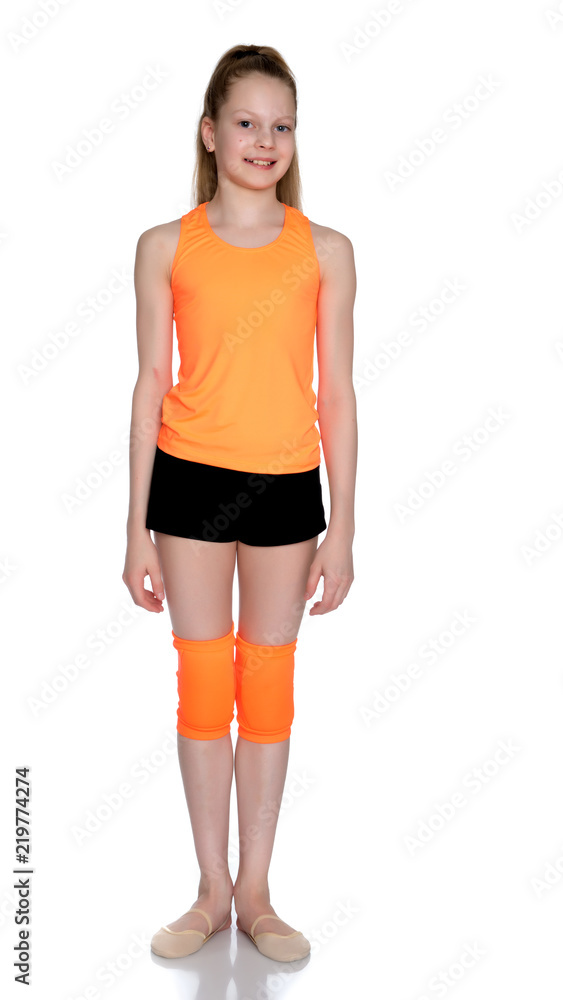 A teenage girl is engaged in fitness. A teenage girl is engaged in fitness.