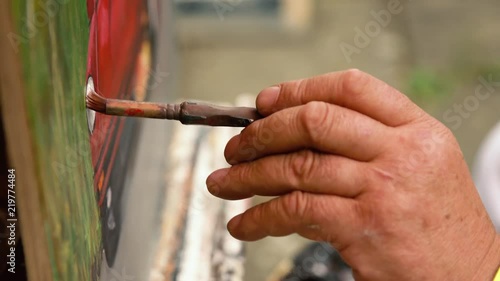 Painting a car, brush