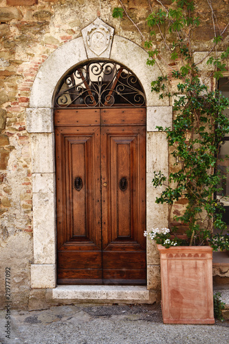 Old wooden door in Tuscany  Italy
