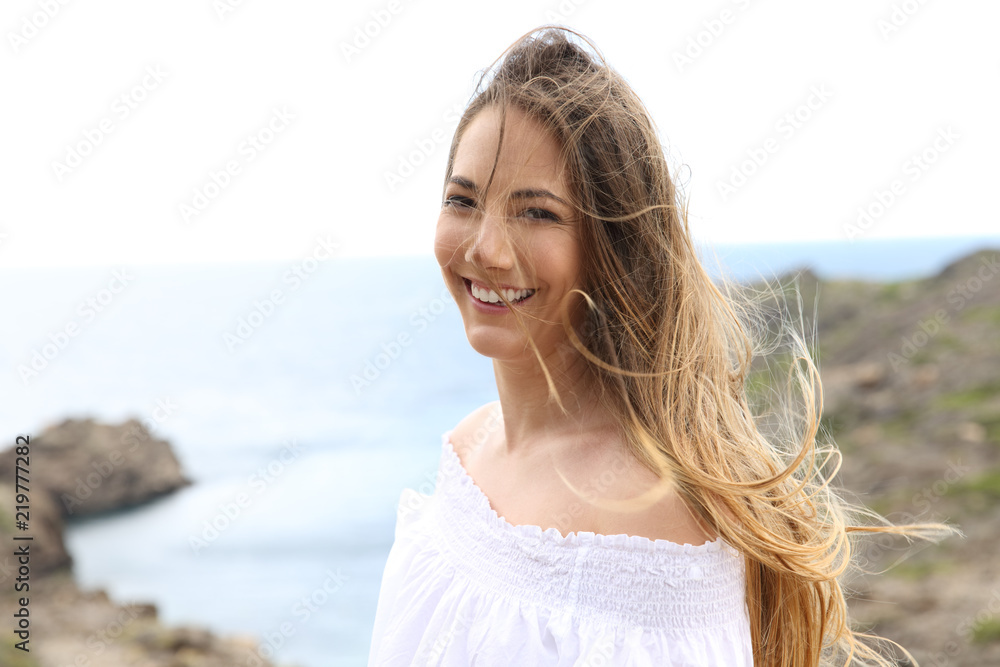 Woman with tangled hair due to the wind Woman with tangled hair due to the wind