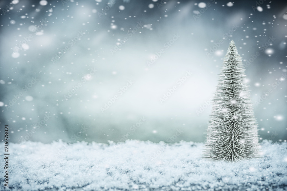 Winter snow background with Christmas tree, front view