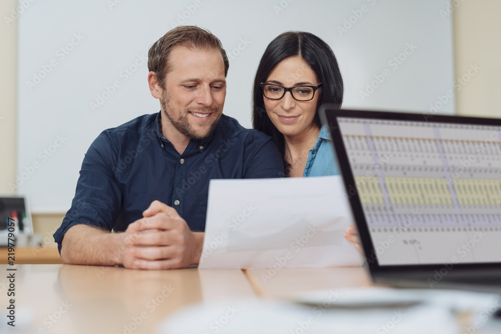 Young married couple seeking business advice Young married couple seeking business advice
