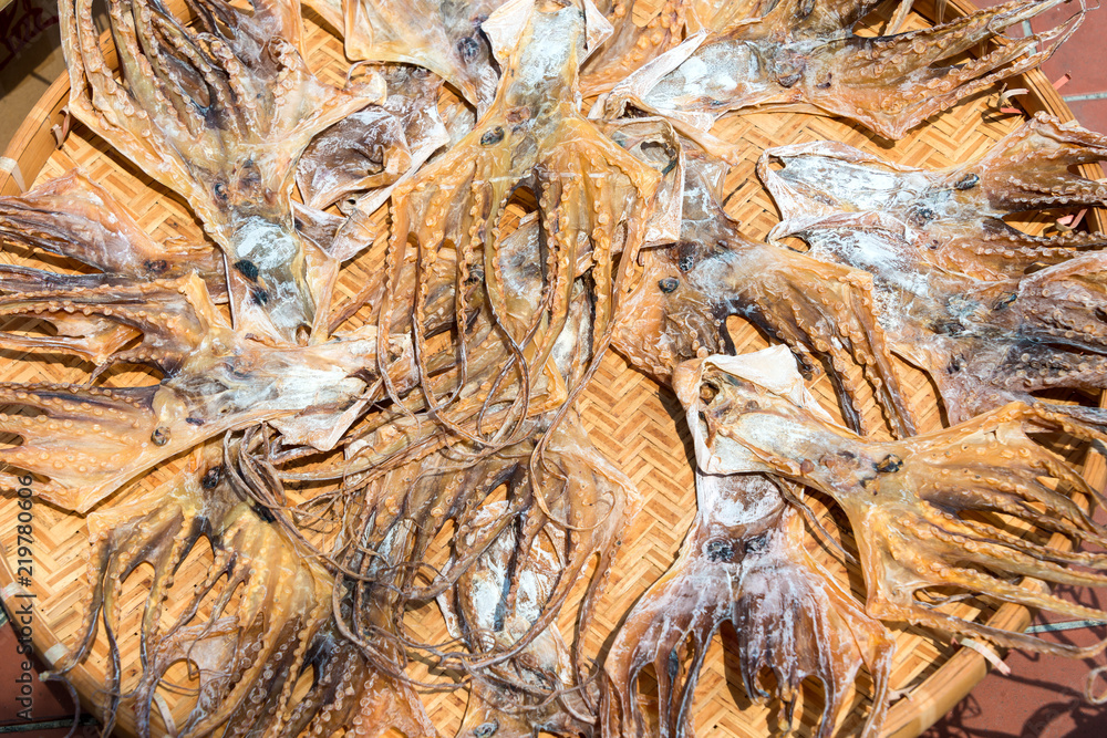 Dried squid on bamboo tray for the ingredients old traditional Chinese Medicine Dried squid on bamboo tray for the ingredients old traditional Chinese Medicine