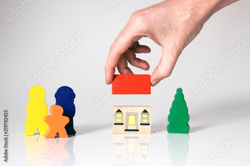 family with house, concept with white background and copy space photo