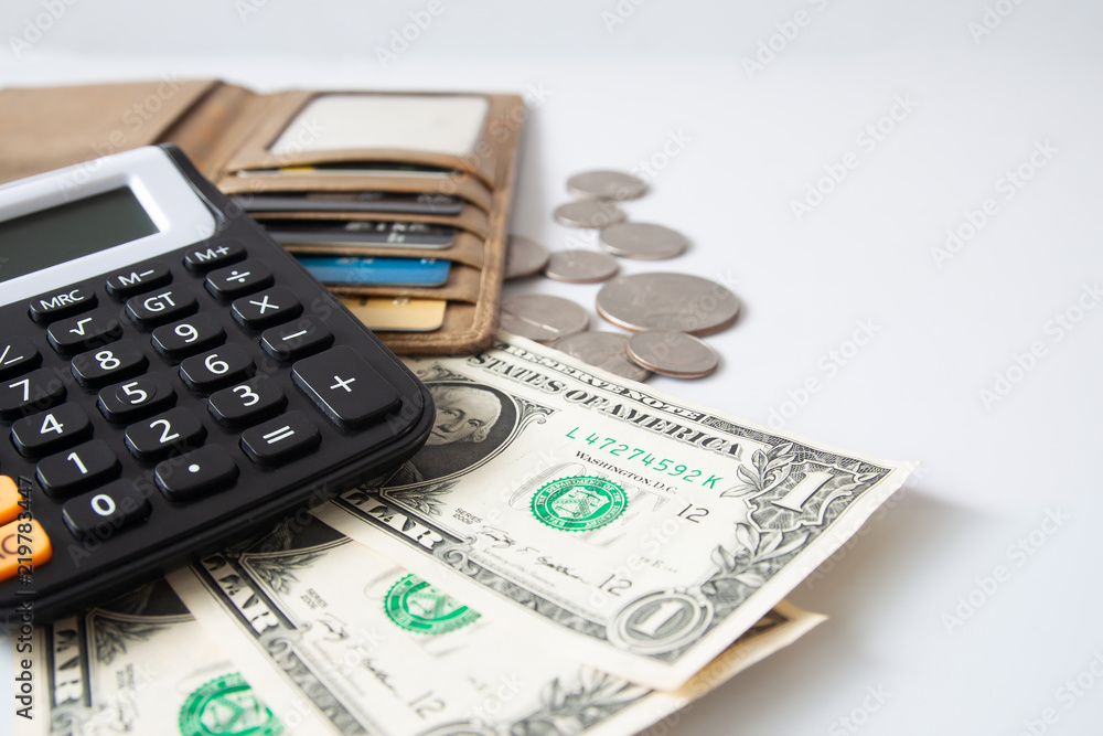 Money, purse wit hcredit card and calculator on white table. Business and Finance Money, purse wit hcredit card and calculator on white table. Business and Finance