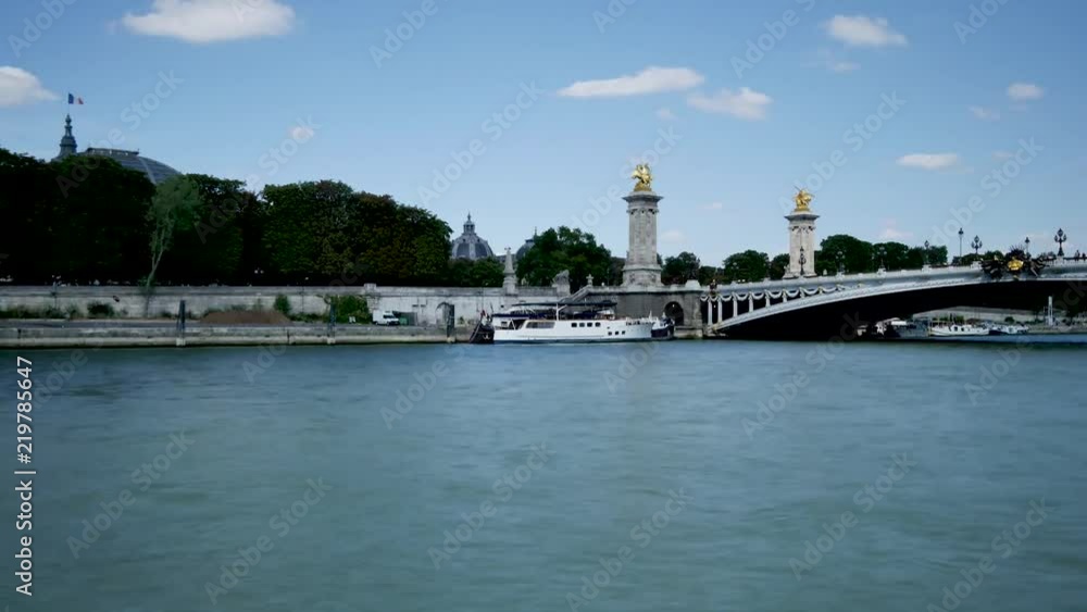 Time lapse in Paris. The Seine, the Alexandre III bridge and the Grand palais (Parisian museum). Time lapse in Paris. The Seine, the Alexandre III bridge and the Grand palais (Parisian museum).