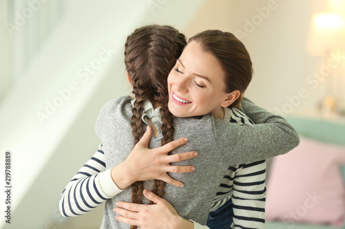 Mother and her little daugh...
