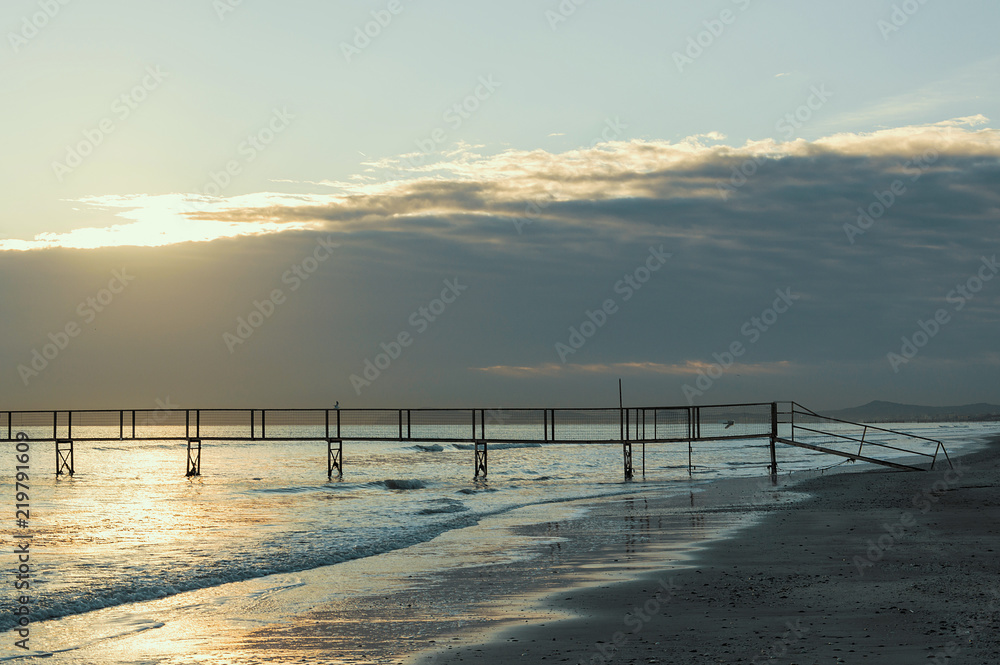 Sandy beaches of Rimini shortly after dawn in winter