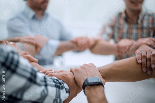 background image.business team standing in a circle