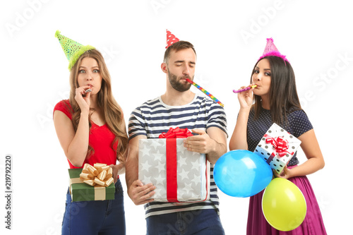 Young people in birthday pa...