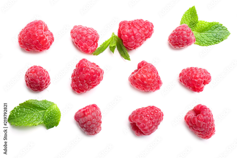 Delicious ripe raspberries with mint on white background Delicious ripe raspberries with mint on white background