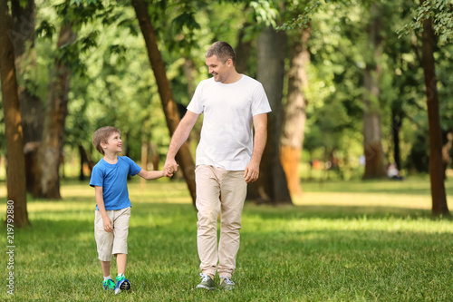 Happy father and son in gre...