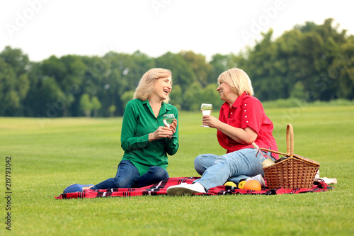 Mature women on a picnic in...
