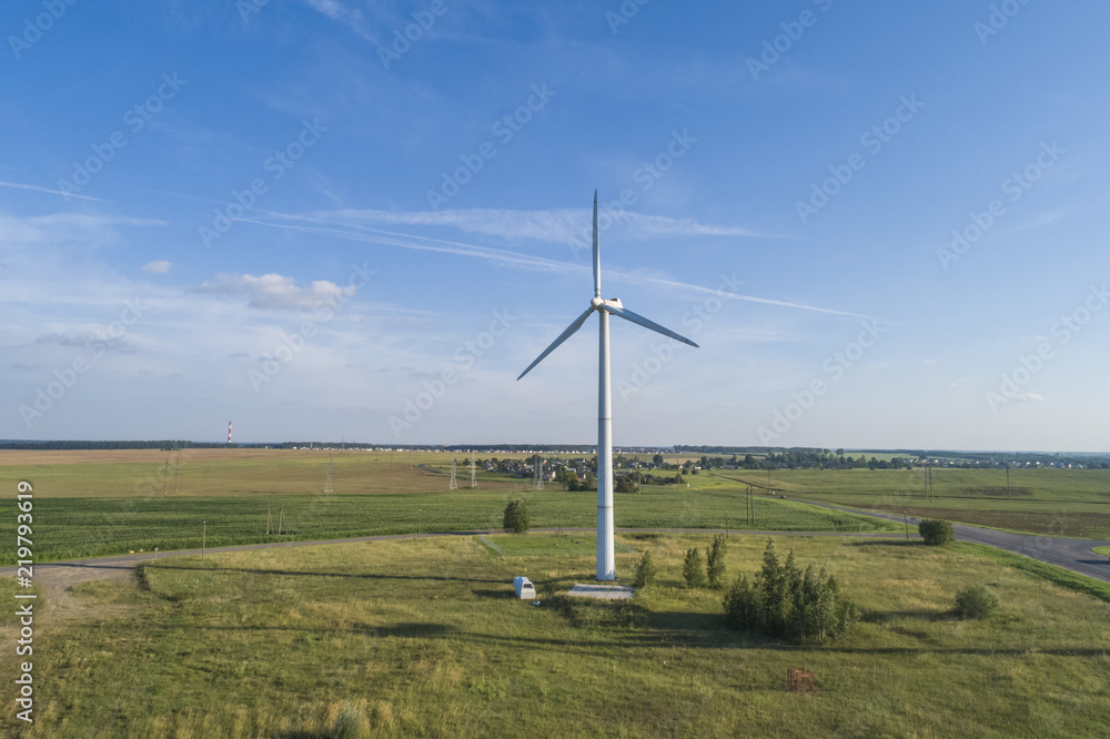 alternative energy sources, wind power, Wind mill during bright summer day alternative energy sources, wind power, Wind mill during bright summer day