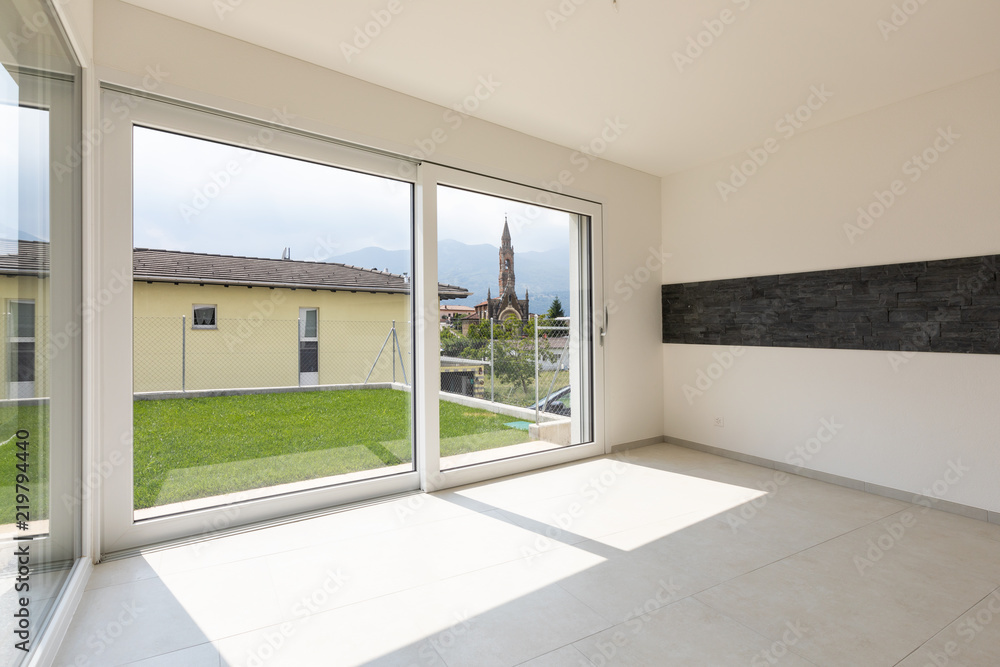 Large room with large bright windows Large room with large bright windows