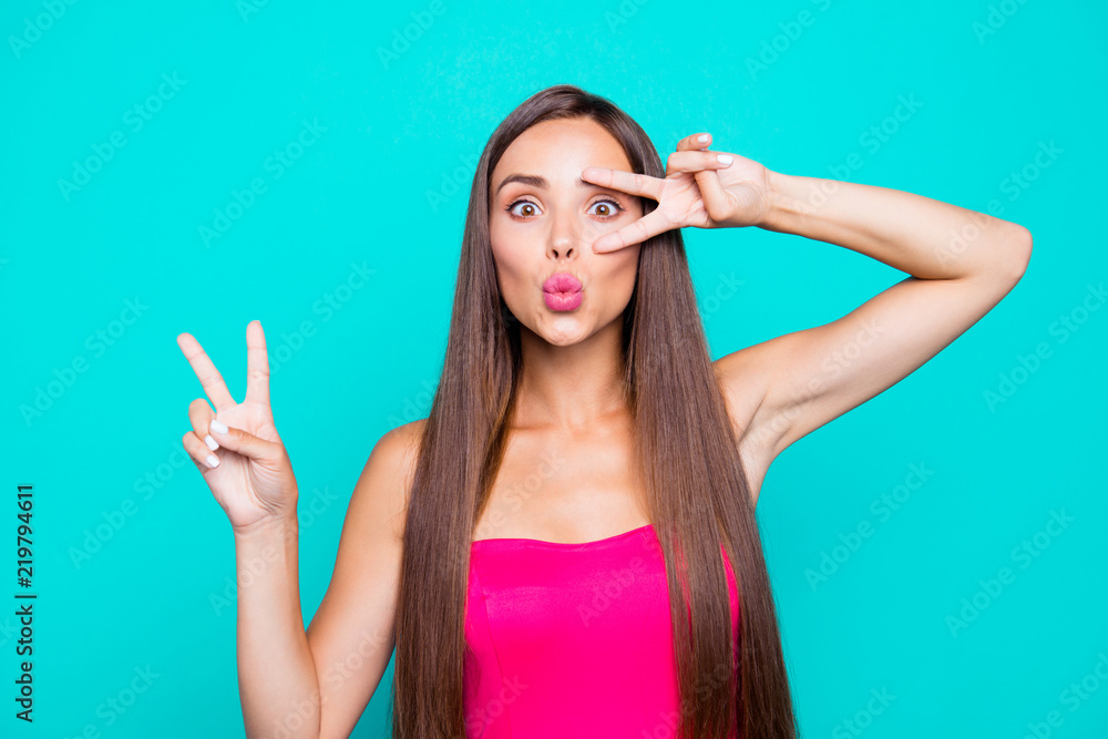Fototapeta premium Hey hi hello! Close up studio photo portrait of sweet lovely winsome fascinating lady giving v-sign staring looking at camera isolated on bright vivid pastel shinny background