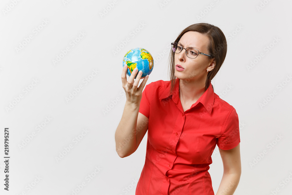 Shocked sad business or teacher woman in red shirt holding in palms Earth globe isolated on white background. Problem of environmental pollution. Stop nature garbage, environment protection concept. Shocked sad business or teacher woman in red shirt holding in palms Earth globe isolated on white background. Problem of environmental pollution. Stop nature garbage, environment protection concept.