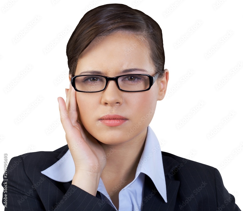 Close-up portrait of young businesswoman in glasses isolated on
