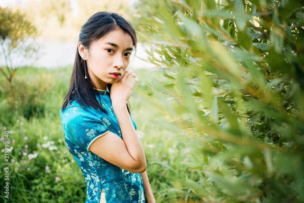 Asian woman with Chinese traditional clothes Asian woman with Chinese traditional clothes