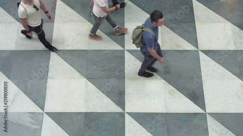 Singapore - May 2018: Elevated view of covered street with people walking.  Business district. 4K resolution 