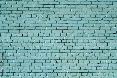 cyan color old grungy brick wall surface.