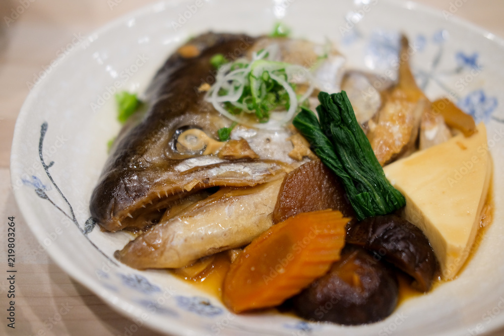 Delicious salmon head boiled with soy sauce