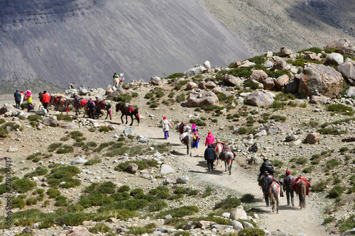 Dorchen, Tibet, China. People with a horse  making parikrama around Kailas in Tibet photo