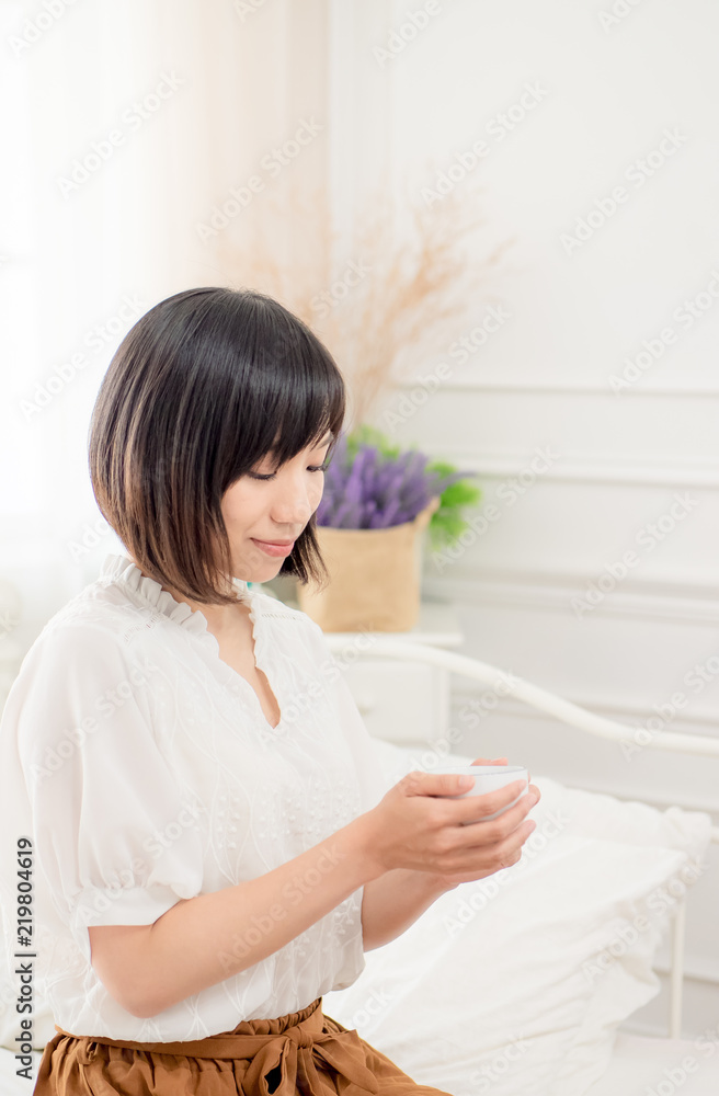 beautiful young woman drinking coffee on bed beautiful young woman drinking coffee on bed