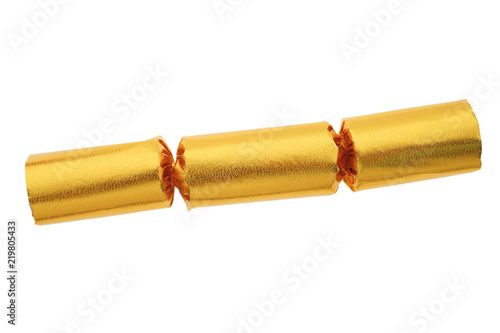 Gold party cracker isolated on white