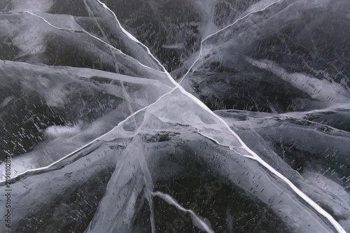 Lake Baikal in winter. Craced icein the form of the star photo