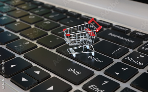Online shopping 3d concept, shopping cart on laptop keyboard, 3d rendering