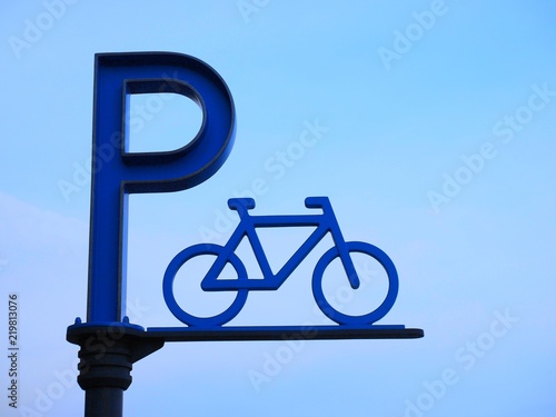 Wallpaper Mural Bike Parking Sign over clear sky  Background Torontodigital.ca